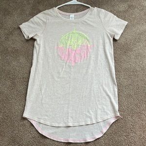 Discontinued ivivva girls size 12 shirt with design.